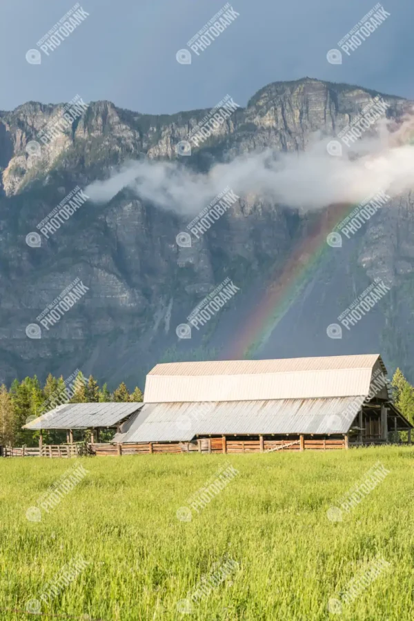 Close up of barn and rainbow