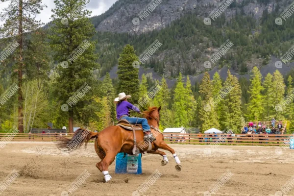 Woman doing barrel racing